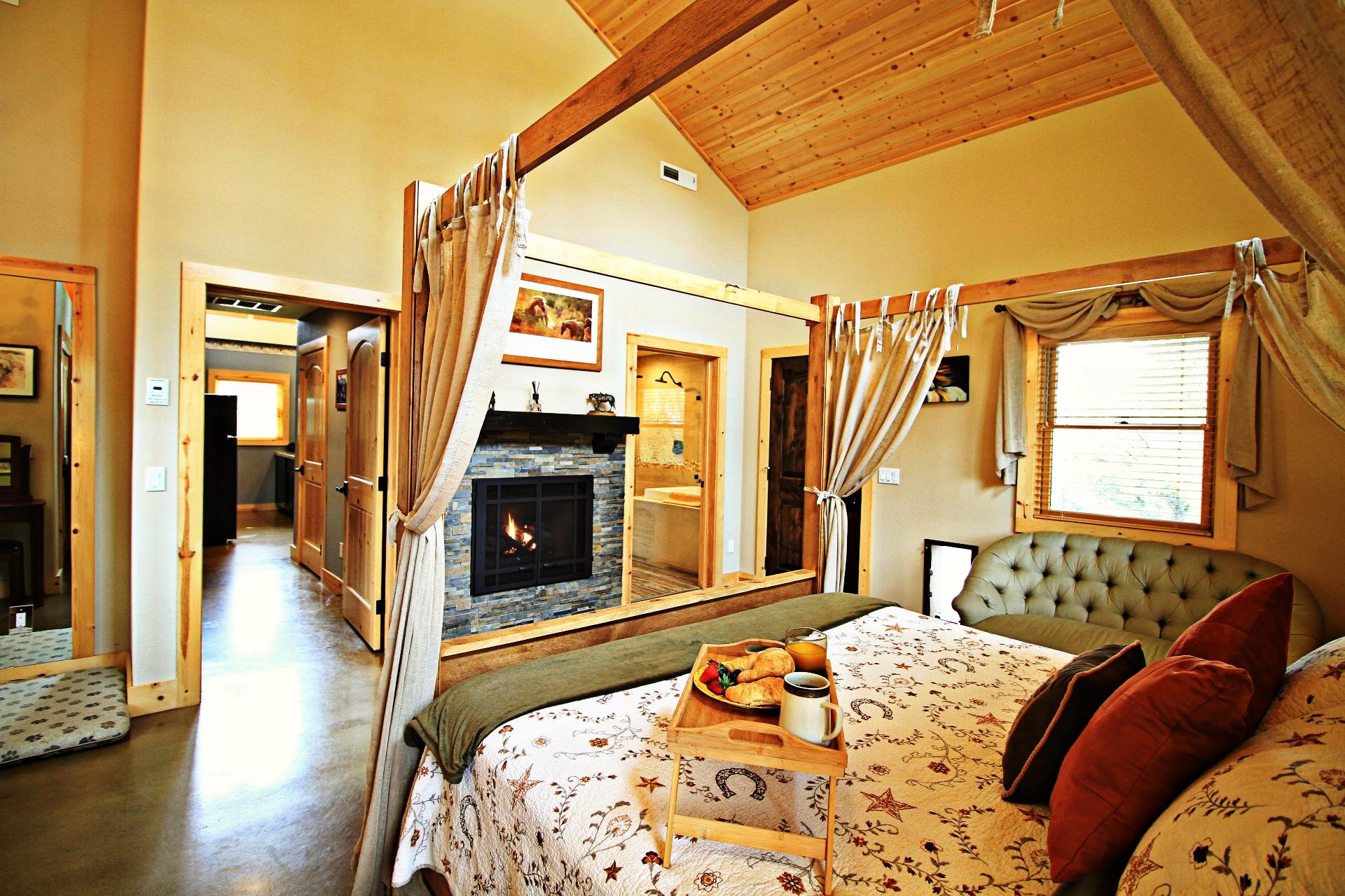 Master bedroom fireplace in pet-friendly Dog and Pony Ranch